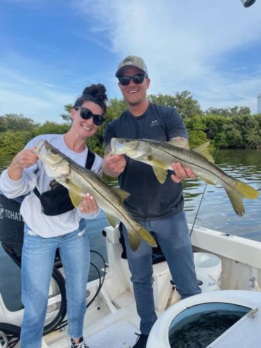 Customers with a pair of Snook